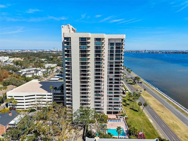 view of building exterior with a water view