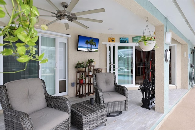 view of patio featuring ceiling fan