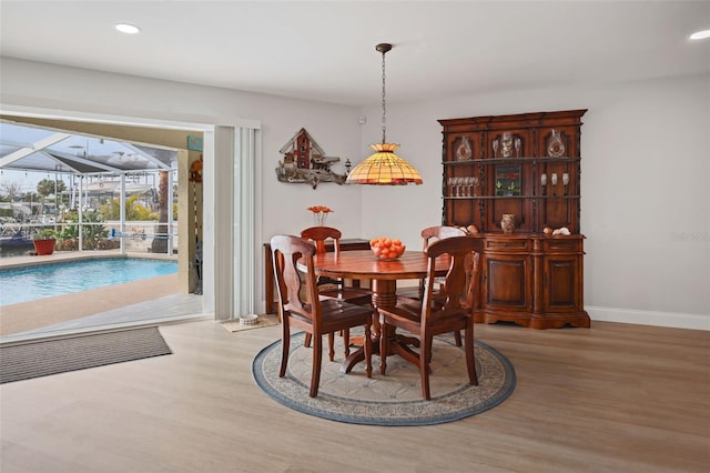 dining area with light wood-type flooring