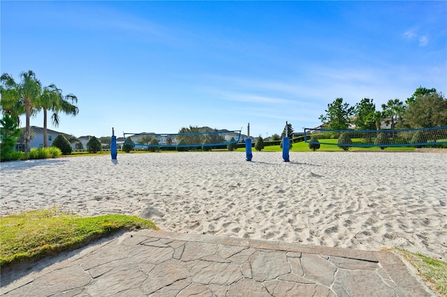 surrounding community featuring volleyball court