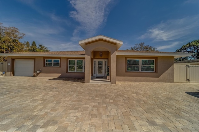 view of front of property featuring a garage