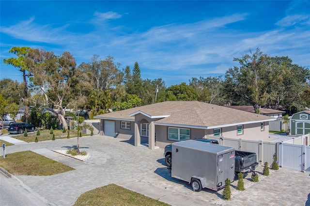 view of front of property with a garage