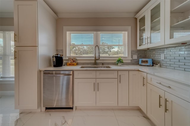 kitchen featuring sink, ornamental molding, white cabinets, and dishwasher