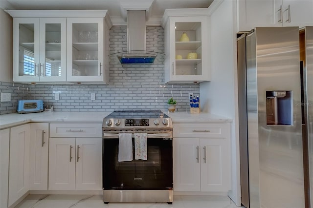 kitchen featuring stainless steel appliances, white cabinetry, light stone countertops, and wall chimney exhaust hood