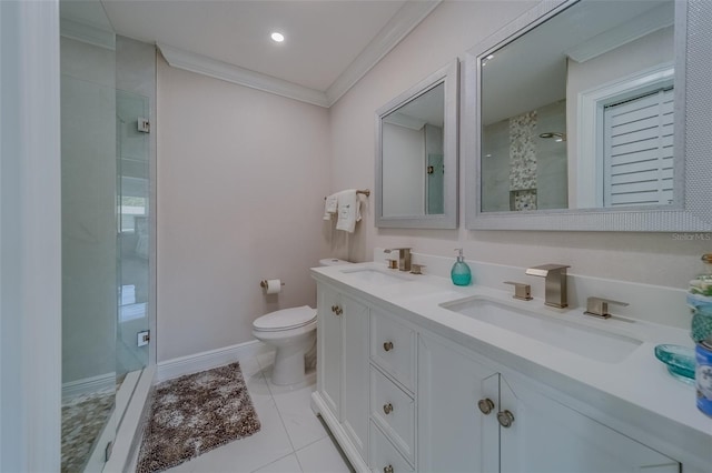 bathroom featuring an enclosed shower, vanity, crown molding, and toilet