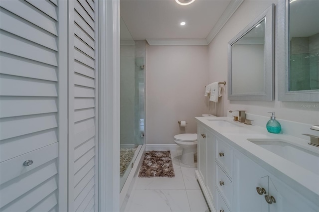 bathroom with an enclosed shower, vanity, crown molding, and toilet