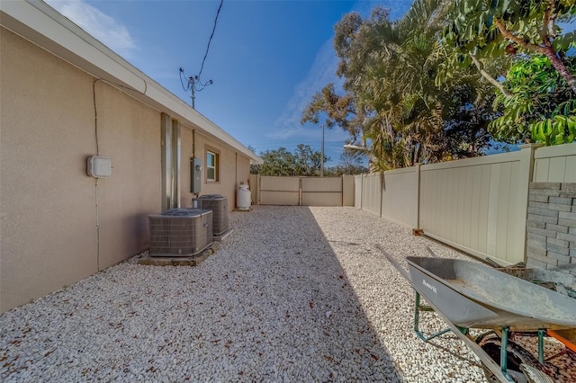 view of yard featuring central AC