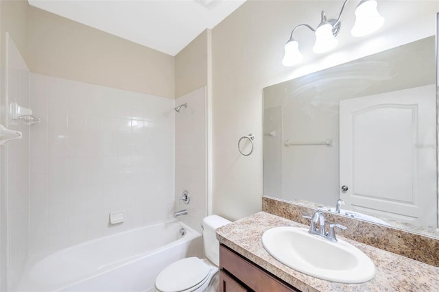 full bathroom with tiled shower / bath combo, vanity, and toilet