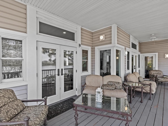 wooden deck featuring french doors