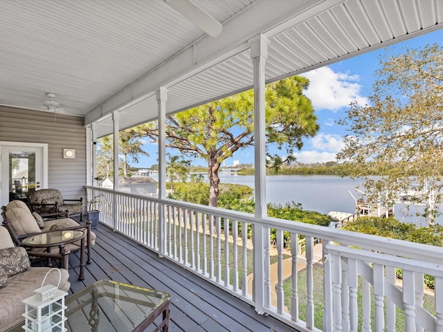 deck featuring a water view