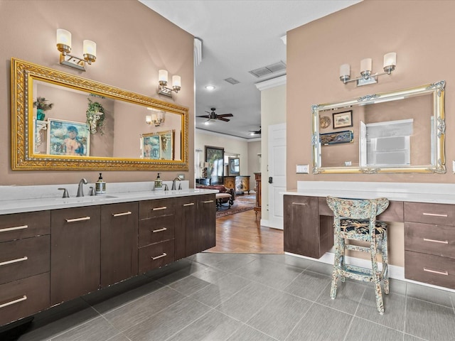 bathroom featuring crown molding, tile patterned floors, vanity, and ceiling fan