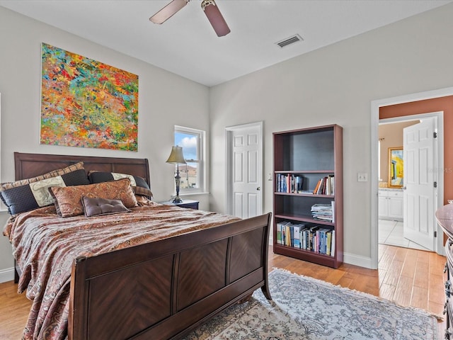 bedroom with ceiling fan and light wood-type flooring