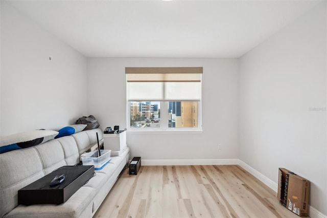 960 Starkey Rd Unit 10301, Largo, FL 33771 - living room with baseboards and light wood finished floors