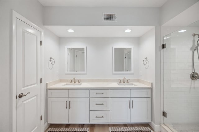 960 Starkey Rd Unit 10301, Largo, FL 33771 - bathroom featuring visible vents, a sink, and double vanity