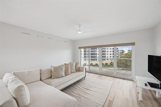960 Starkey Rd Unit 10301, Largo, FL 33771 - living room with ceiling fan and light wood finished floors
