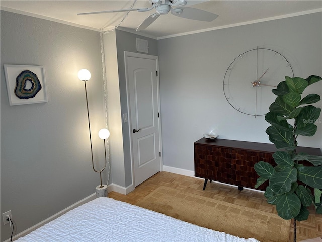 bedroom featuring light parquet floors, ornamental molding, and ceiling fan