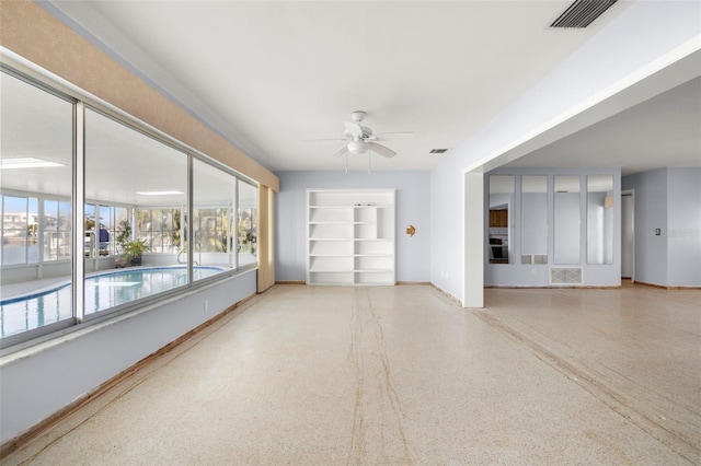 empty room with ceiling fan