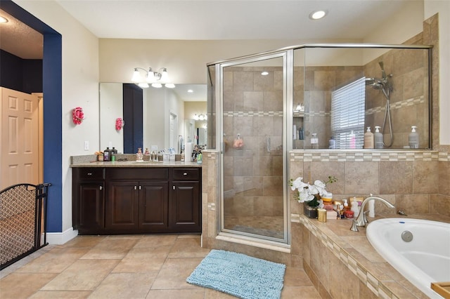 bathroom featuring vanity, tile patterned floors, and plus walk in shower