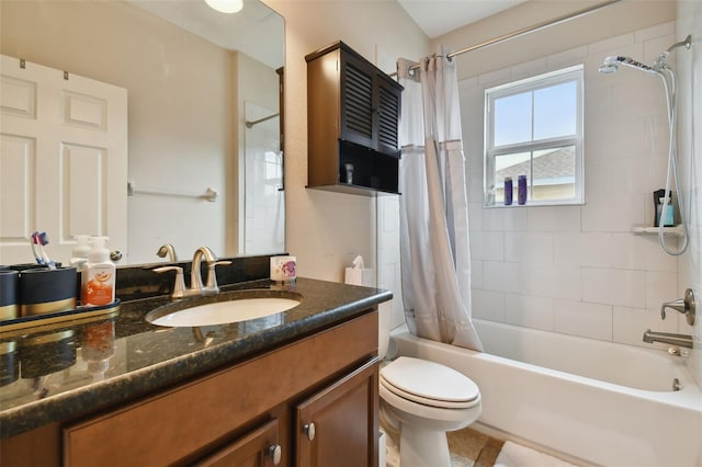 full bathroom with vanity, toilet, and shower / bath combo