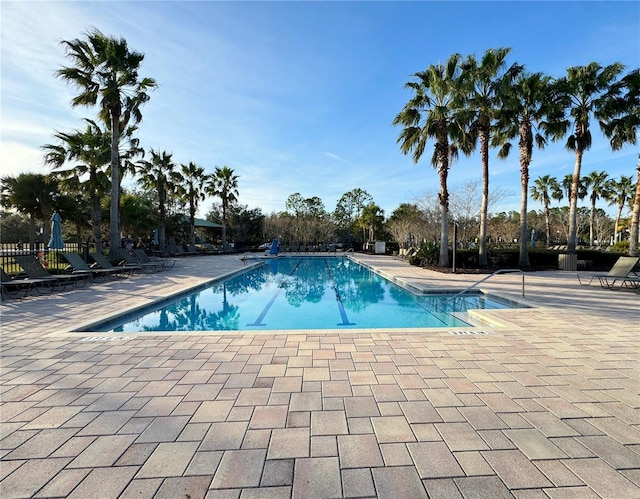 view of swimming pool featuring a patio