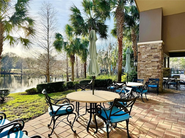 view of patio / terrace featuring a water view