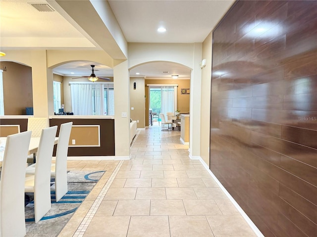 corridor featuring light tile patterned flooring