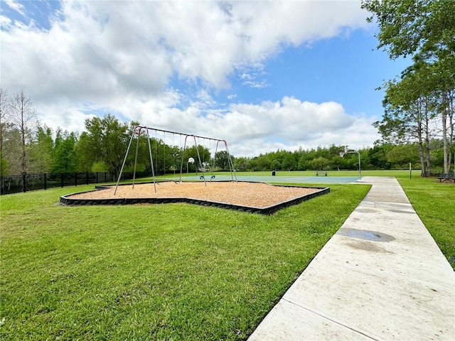 surrounding community featuring a yard and a playground