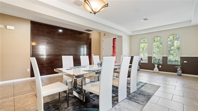 4110 Huntingdale Ct, Wesley Chapel, FL 33543 - tiled dining area with baseboards and a raised ceiling