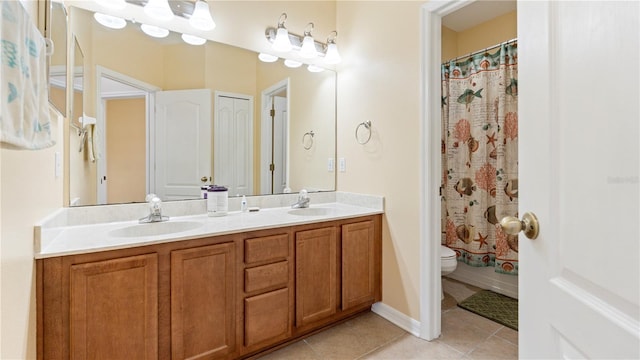 4110 Huntingdale Ct, Wesley Chapel, FL 33543 - full bathroom with tile patterned flooring, double vanity, toilet, and a shower with curtain