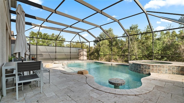 4110 Huntingdale Ct, Wesley Chapel, FL 33543 - view of pool with a pool with connected hot tub, a patio, and glass enclosure