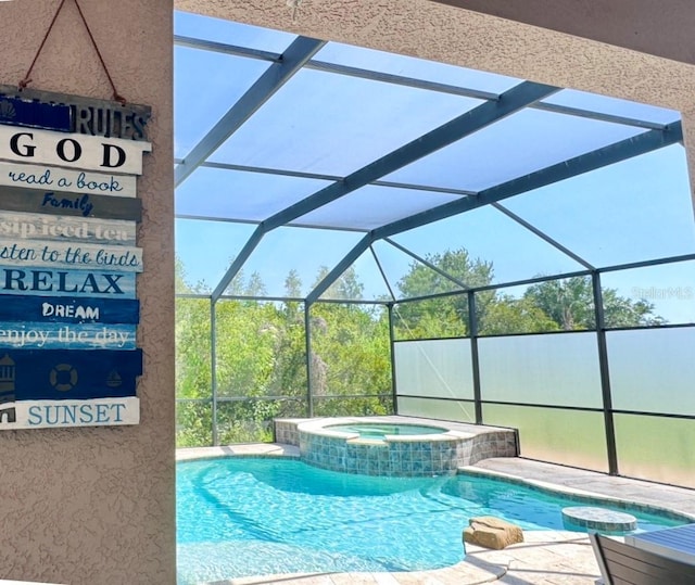 4110 Huntingdale Ct, Wesley Chapel, FL 33543 - view of pool featuring a pool with connected hot tub and glass enclosure