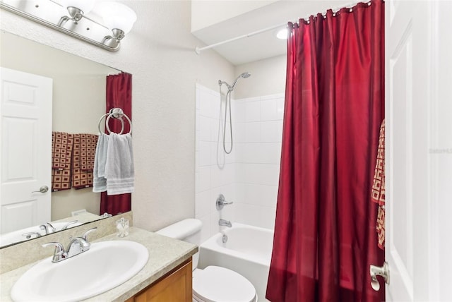 full bathroom with vanity, shower / bath combination with curtain, and toilet