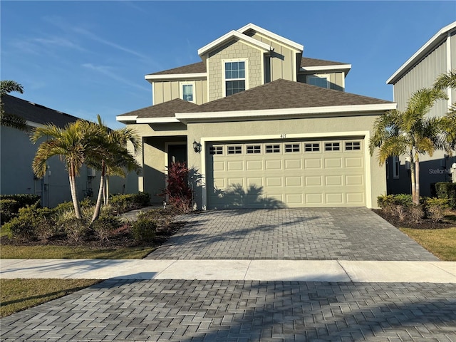 view of front of property with a garage