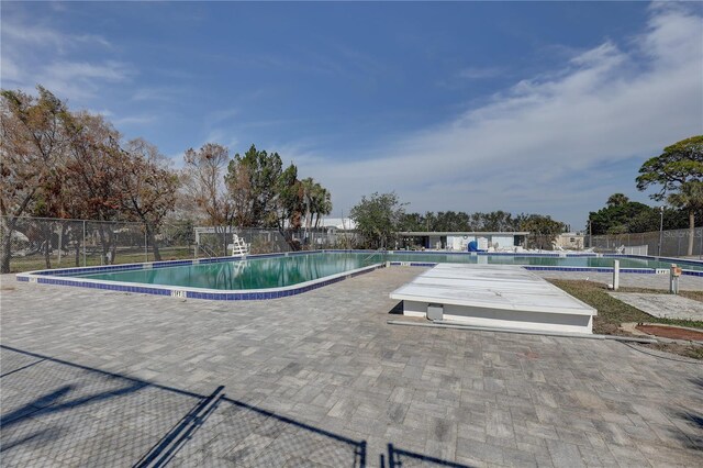 view of swimming pool featuring a patio area