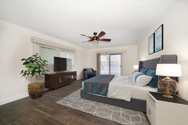 bedroom featuring dark wood-type flooring, access to outside, and ceiling fan