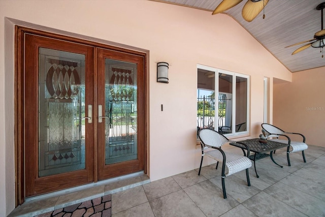 doorway to property with french doors and ceiling fan