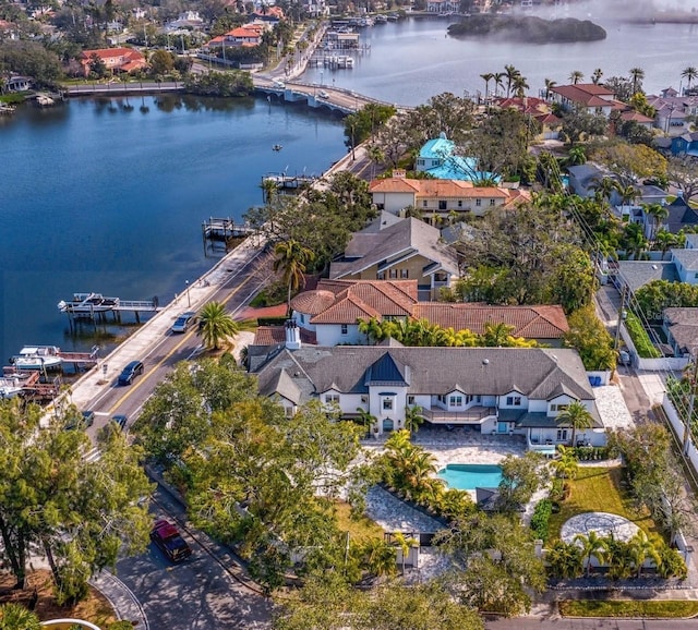 drone / aerial view with a water view