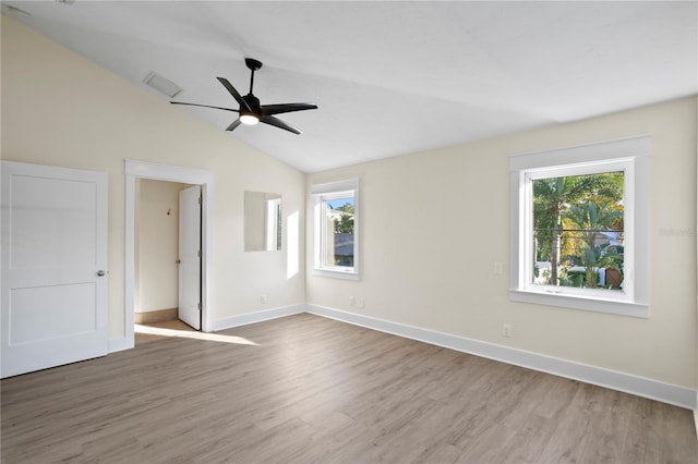 unfurnished bedroom with lofted ceiling, light hardwood / wood-style flooring, and ceiling fan