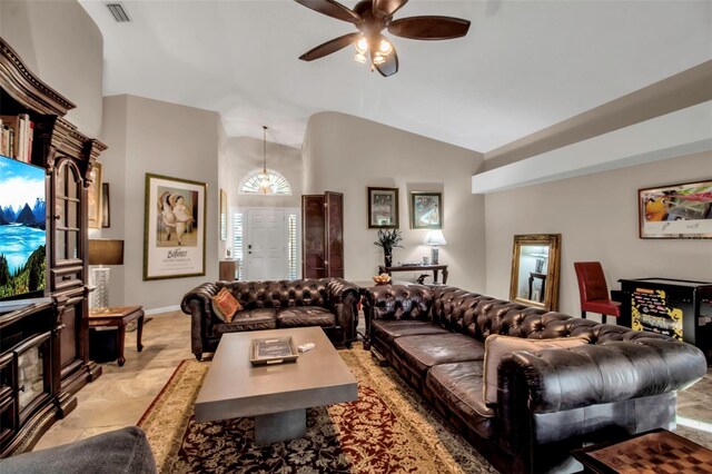 living room with vaulted ceiling and ceiling fan