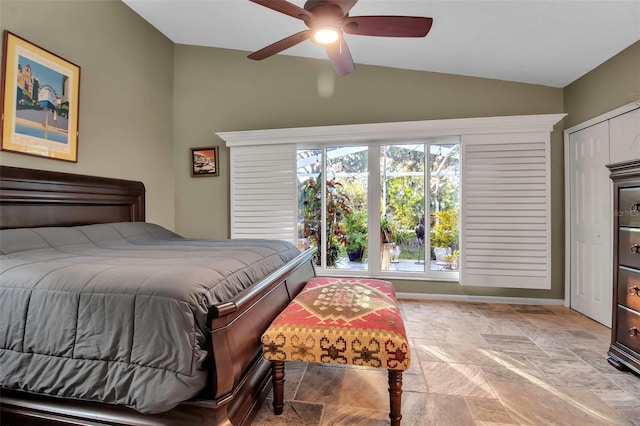 bedroom featuring ceiling fan and lofted ceiling