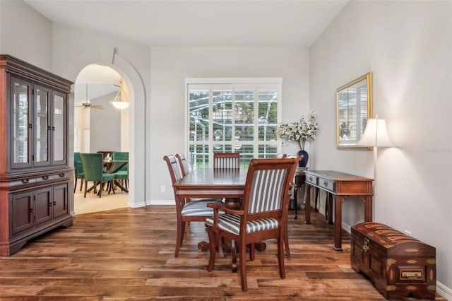 dining space featuring dark hardwood / wood-style floors