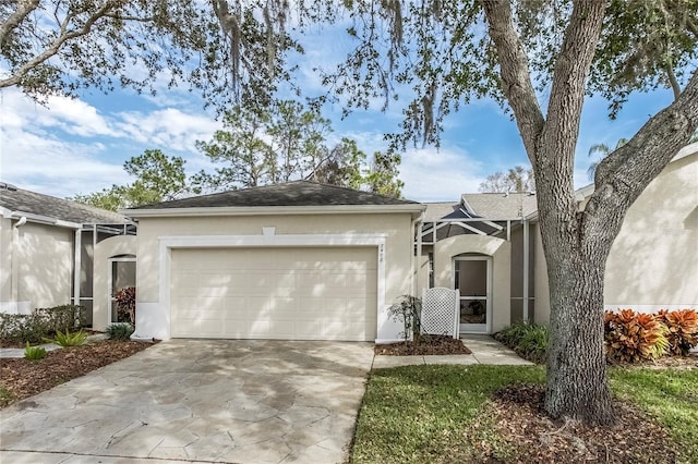 ranch-style home featuring a garage