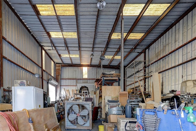 garage featuring white fridge