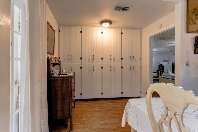 bedroom with light hardwood / wood-style floors