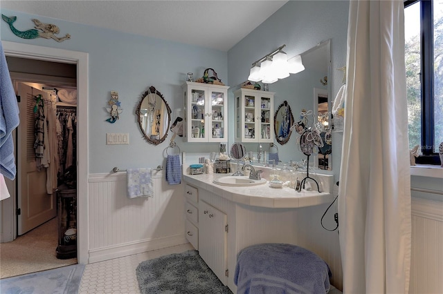 bathroom featuring vanity and tile patterned flooring