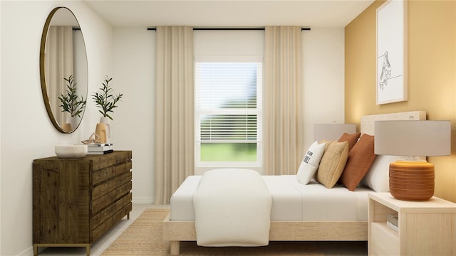 bedroom featuring multiple windows