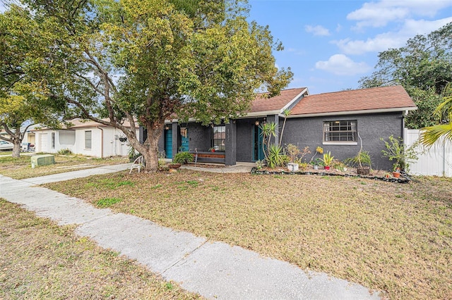 view of front of home with a front lawn