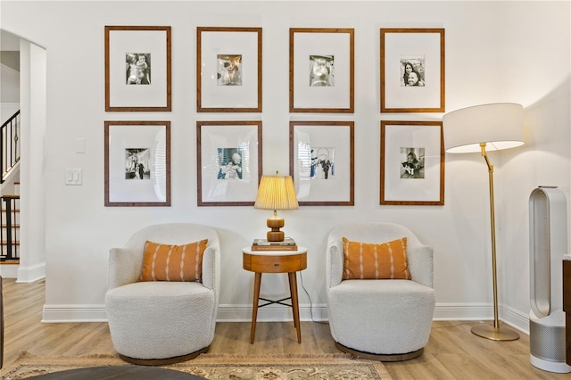 living area featuring hardwood / wood-style floors