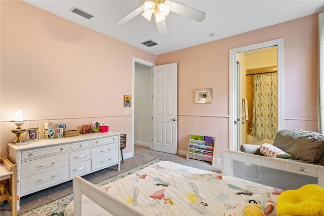 bedroom featuring light carpet and ceiling fan