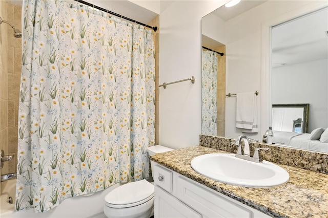 full bathroom with vanity, toilet, and shower / bath combo with shower curtain